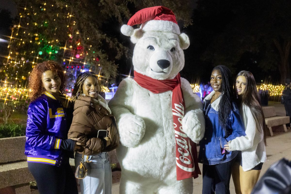 The Coca-Cola polar bear takes pictures with students Free Speech Alley in Baton Rouge, La.