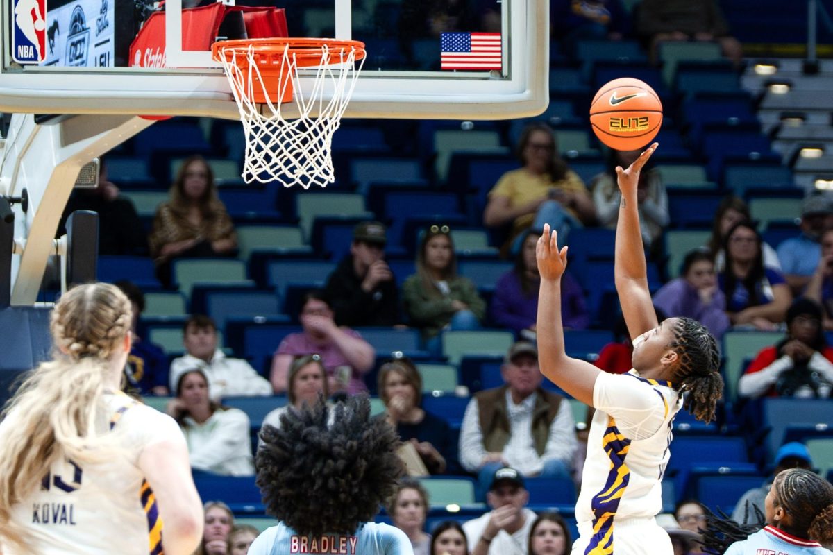 LSU women's basketball junior guard Mikaylah Williams (12) shoots the ball during the Tigers' 87-61 victory over LA Tech Saturday, Dec. 13, 2025, at the Smoothie King Center in New Orleans, La.