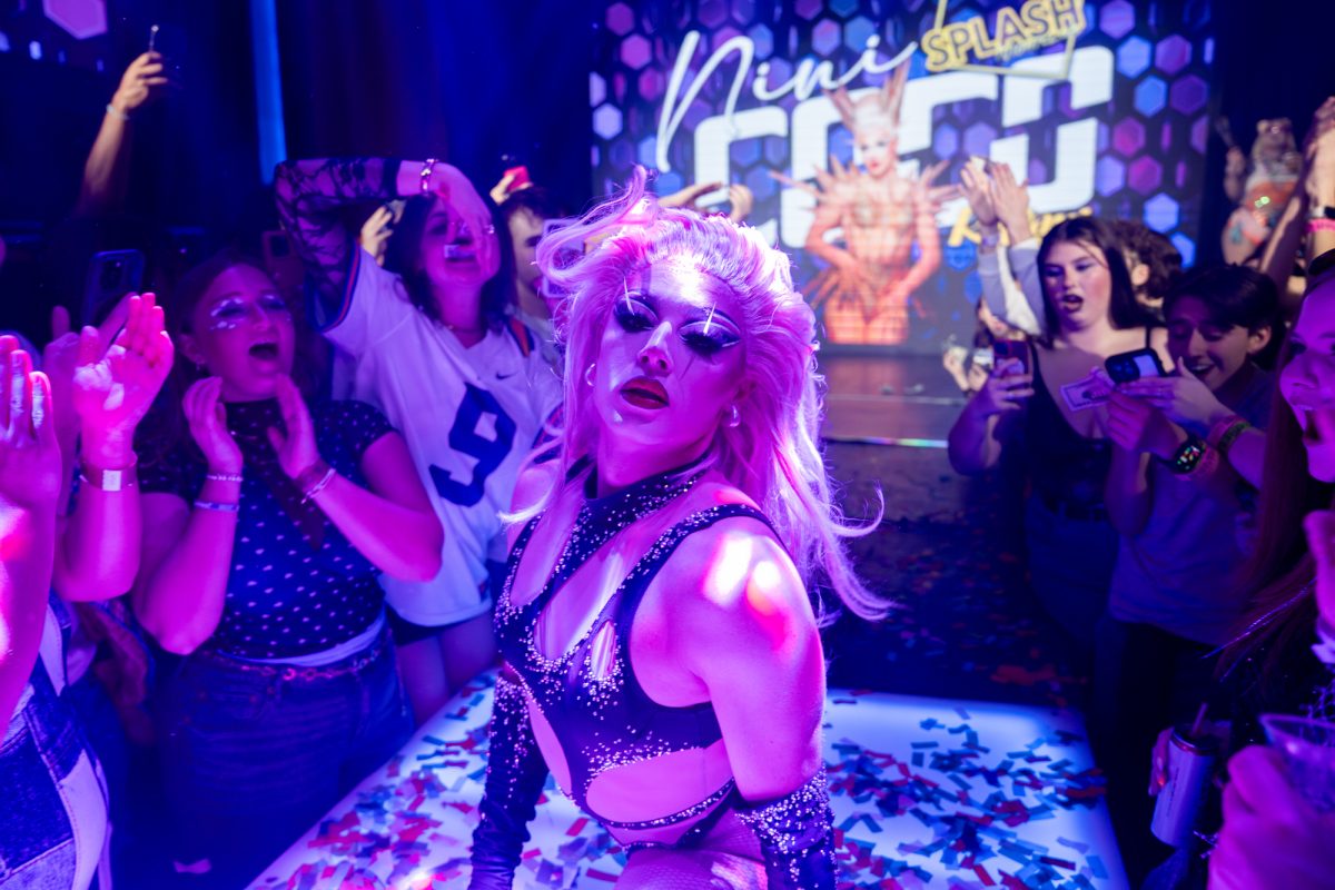 RuPaul’s Drag Race queen Nini Coco performs a split on stage Saturday, Jan. 31, 2026, during Splash’s twenty-second anniversary weekend at Splash Nightclub in Baton Rouge, La.