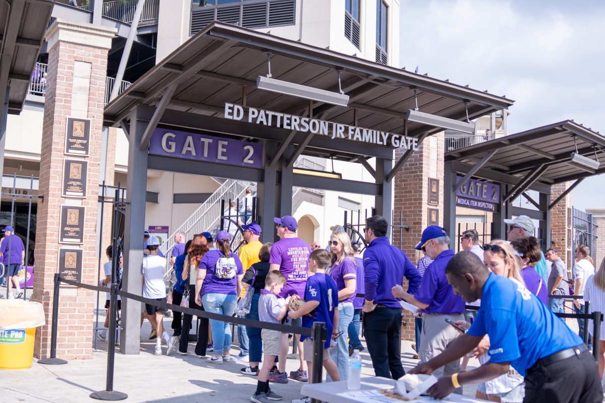 Fans enter the stadium during LSU baseball's fan fest Friday, Feb. 13, 2026, at Alex Box Stadium in Baton Rouge, La.