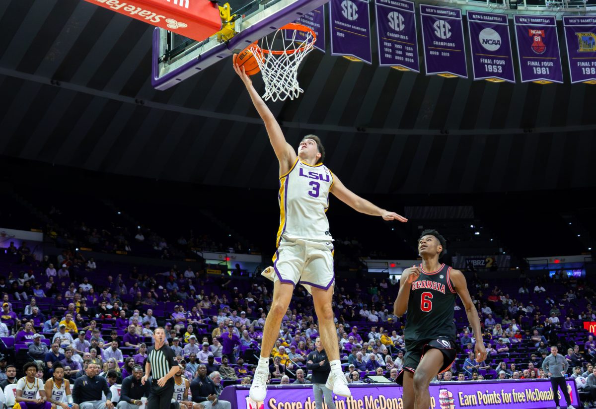 LSU men's basketball senior guard Max Mackinnon (3) goes up to the rim during the Tigers' 83-71 loss against Georgia Saturday, Feb. 7, 2026, at the Pete Maravich Assembly Center in Baton Rouge, La.