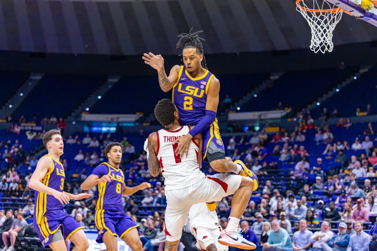 LSU men’s basketball freshman guard Jalen Reece (2) blocks an Arkansas player during LSU’s game against Arkansas on Tuesday, Feb. 10, 2026, at the Pete Maravich Assembly Center in Baton Rouge, La.