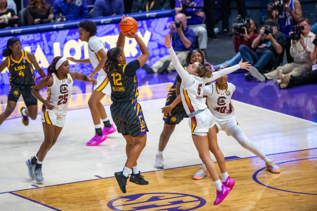 LSU women's basketball junior guard Mikaylah Williams (12) shoots Saturday, Feb. 14, 2026, during the 79-72 loss to South Carolina at the Pete Maravich Assembly Center in Baton Rouge, La.
