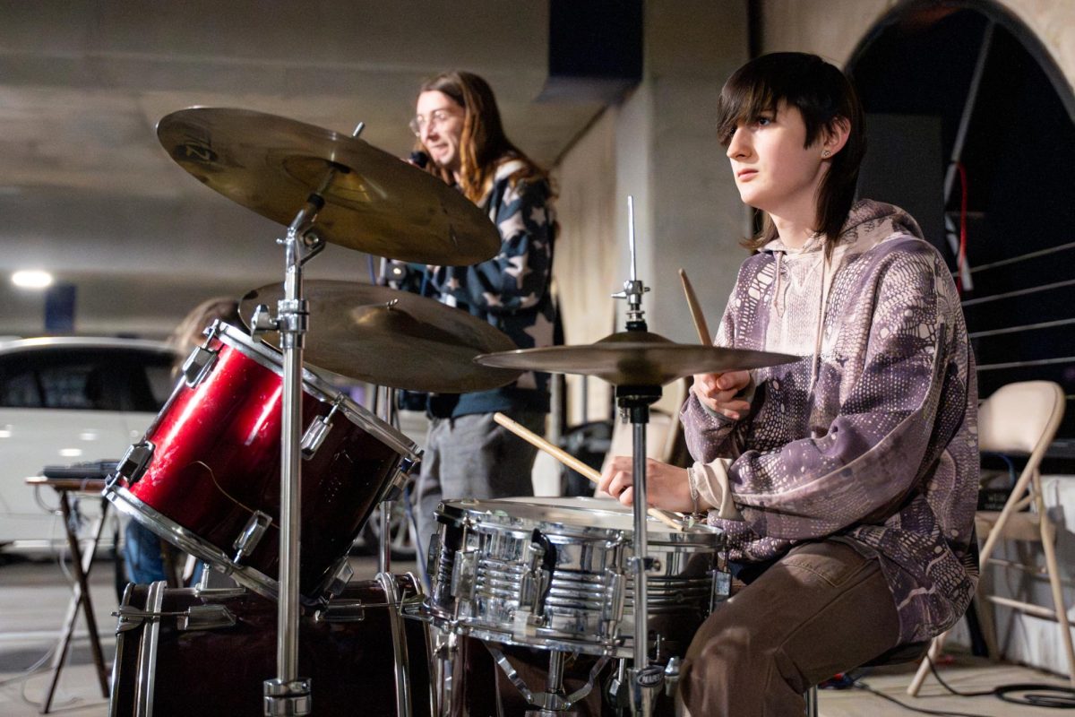 A band member plays the drums Wednesday, Feb. 4, 2026, at the Union Square Parking Garage in Baton Rouge, La.