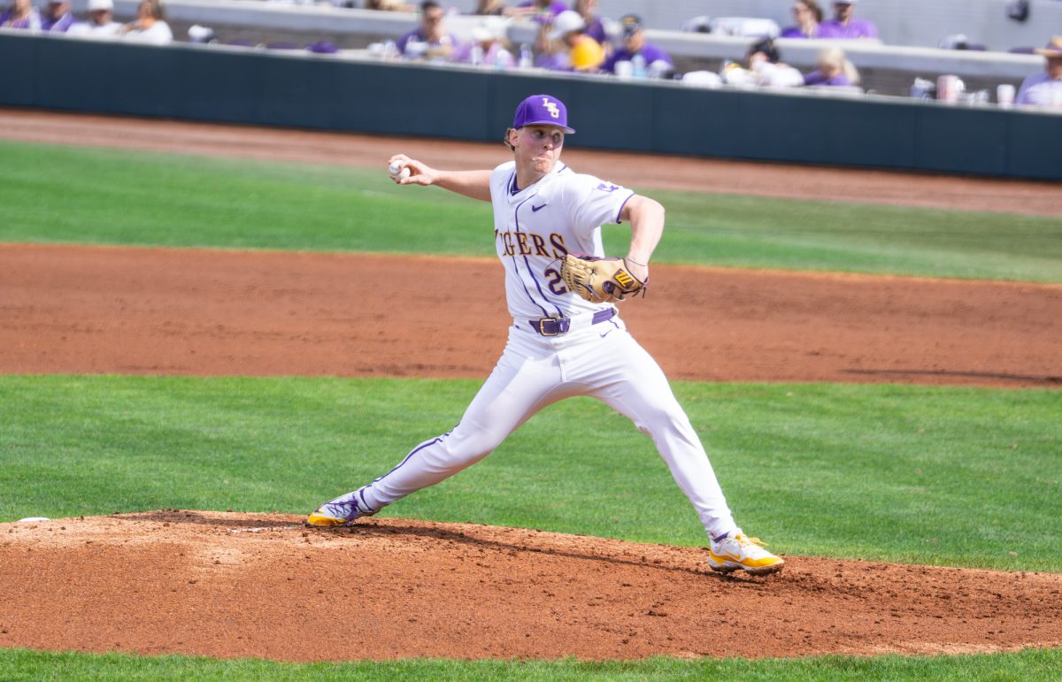 LSU baseball junior right-handed pitcher Cooper Moore (22) pitches the ball during the Tigers' 5-3 win over Milwaukee Saturday, Feb. 14, 2026, at Alex Box Stadium in Baton Rouge, La.