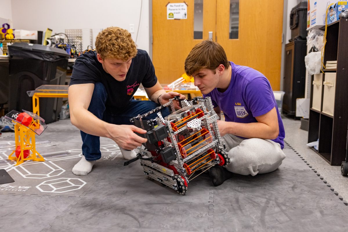 Members of LSU’s Bengal Bots Club work on one of the club’s robots during a meeting on Wednesday, Feb. 11, 2026, in Baton Rouge, La.