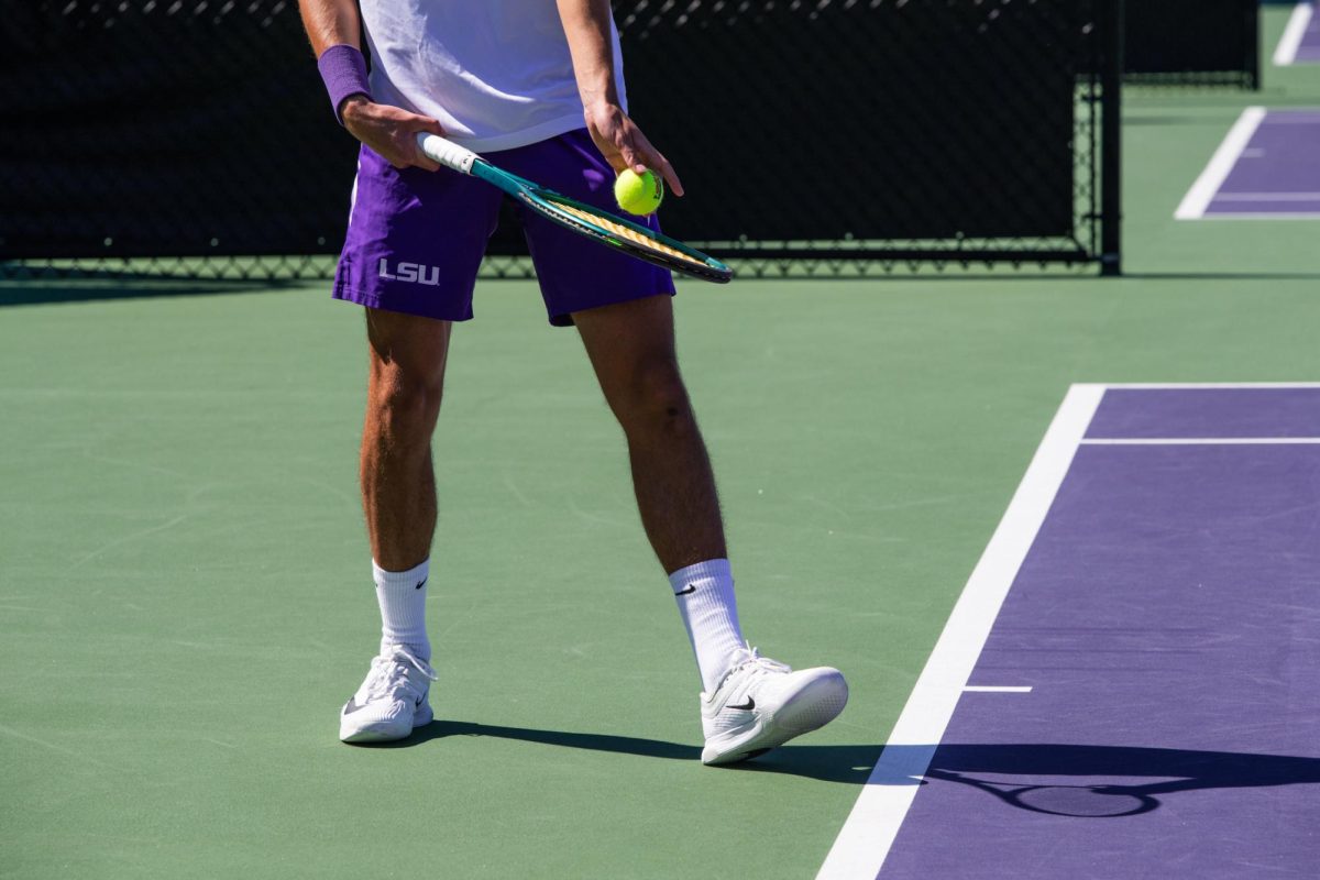 LSU men’s tennis sophomore Sasa Markovic prepares to serve the ball during his singles win against Ole Miss on Sunday, March 1, 2026, at the LSU Tennis Complex in Baton Rouge, La.