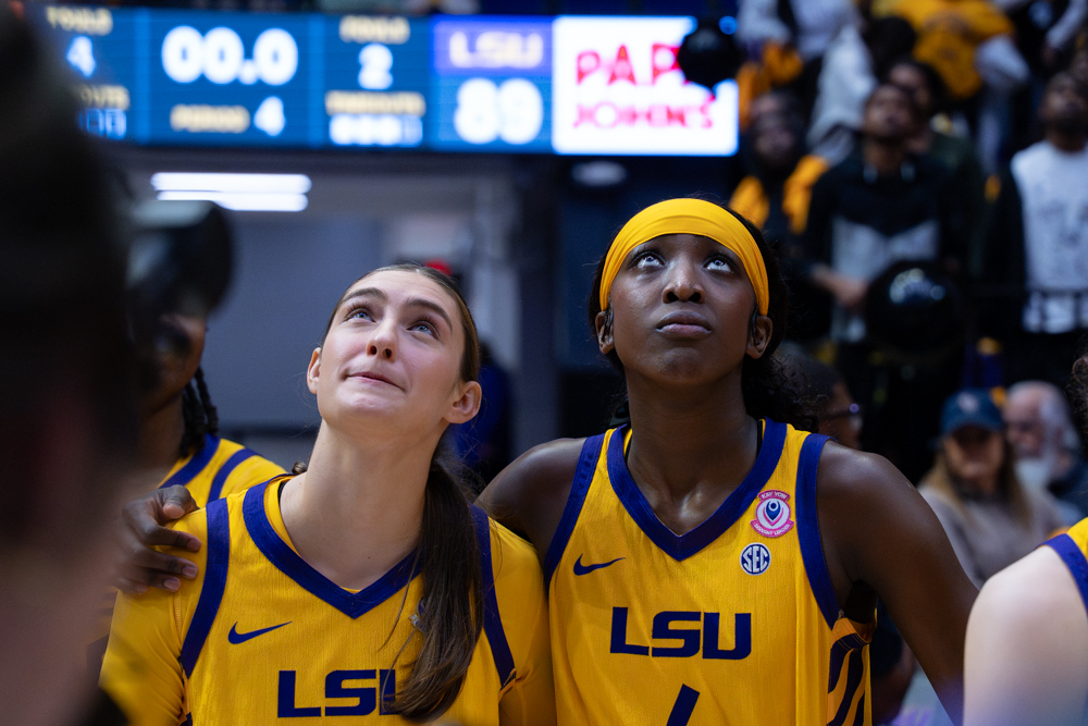 LSU women’s basketball senior guard Flau'jae Johnson (4) and senior guard Izzy Besselman (14) look up during the Tigers’ 89-73 victory over Tennessee Thursday, Feb. 26, 2026, at the Pete Maravich Assembly  Center in Baton Rouge, La.