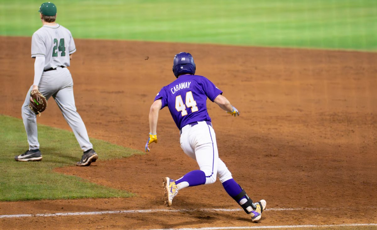 LSU baseball junior infielder Trent Caraway (44) rounds first during the Tigers' 5-3 win over Dartmouth Friday, Feb. 28, 2026 at Alex Box Stadium in Baton Rouge, La.