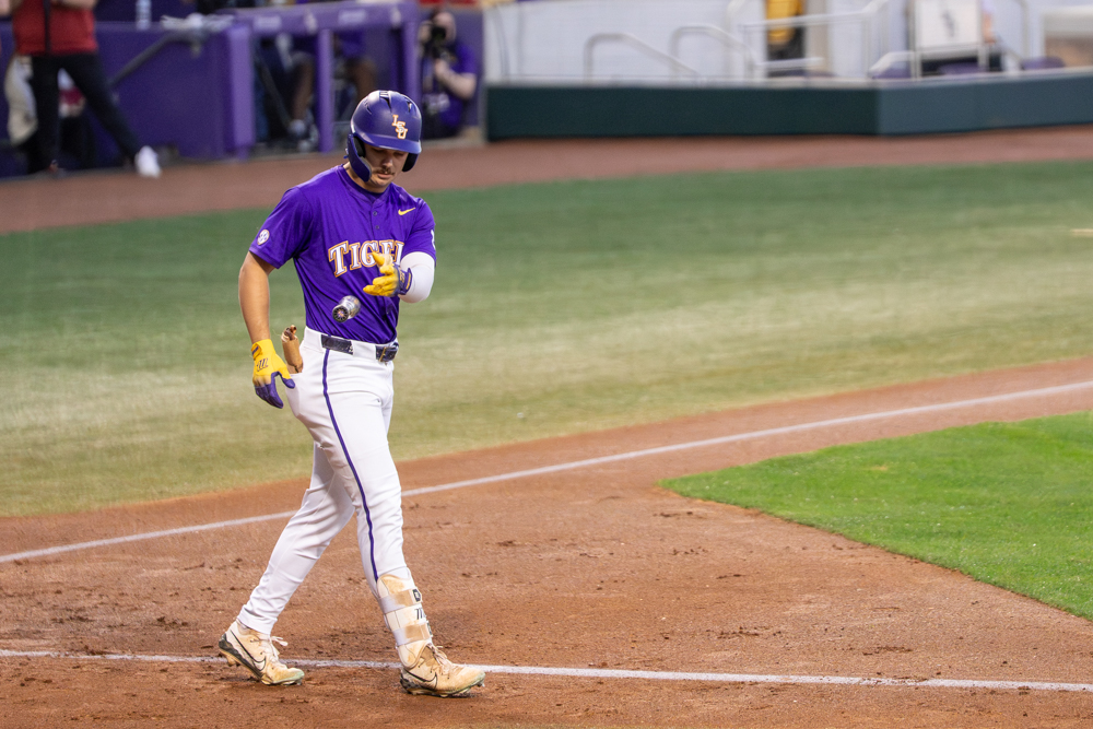 LSU baseball junior outfielder Jake Brown (7) throws a bat during the Tigers' 7-1 victory vs Oklahoma Thursday, March 19, 2026, at Alex Box Stadium in Baton Rouge, La.