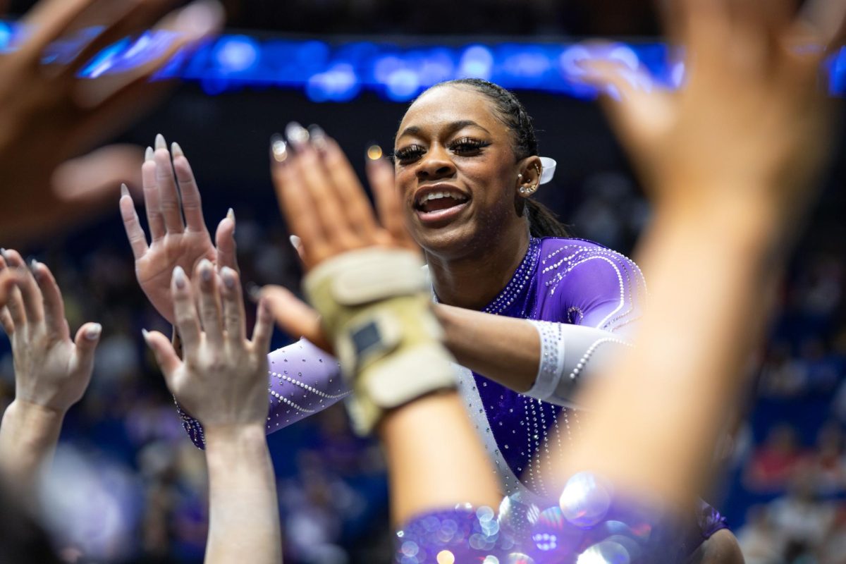 LSU gymnastics all-around junior Amari Drayton celebrates with teammates during the SEC Championship loss Saturday, March 21, 2026, at the Bank of Oklahoma Center in Tulsa, Okla.