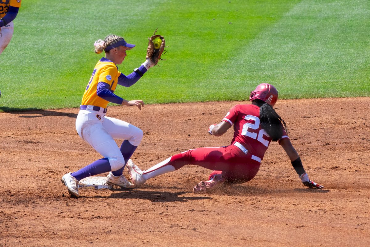 LSU softball junior infield Kylee Edwards (67) tags the runner Sunday, March 29, 2026 during their 4-8 loss to Oklahoma at Tiger Park in Baton Rouge, La.