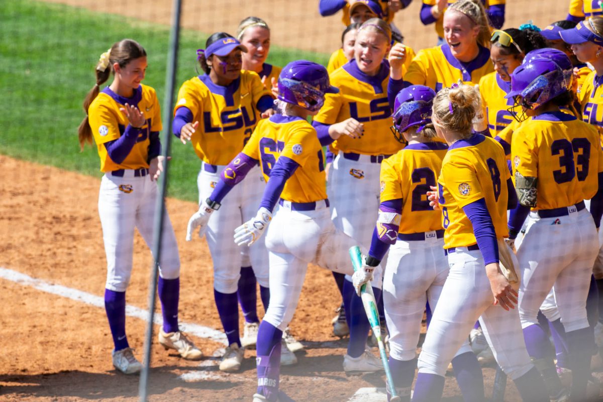 LSU softball junior infield Kylee Edwards (67) touches home plate Sunday, March 29, 2026 during their 4-8 loss to Oklahoma at Tiger Park in Baton Rouge, La.