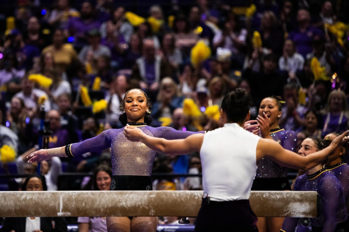 LSU gymnastics all-around junior Konnor McClain celebrates after her beam routine during LSU’s 197.975-197.600 win against Alabama on Friday, Feb. 27, 2026, at the Pete Maravich Assembly Center in Baton Rouge, La.