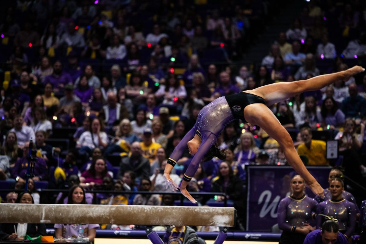 LSU gymnastics all-around sophomore Kailin Chio mounts the beam during LSU’s 197.975-197.600 win against Alabama on Friday, Feb. 27, 2026, at the Pete Maravich Assembly Center in Baton Rouge, La.
