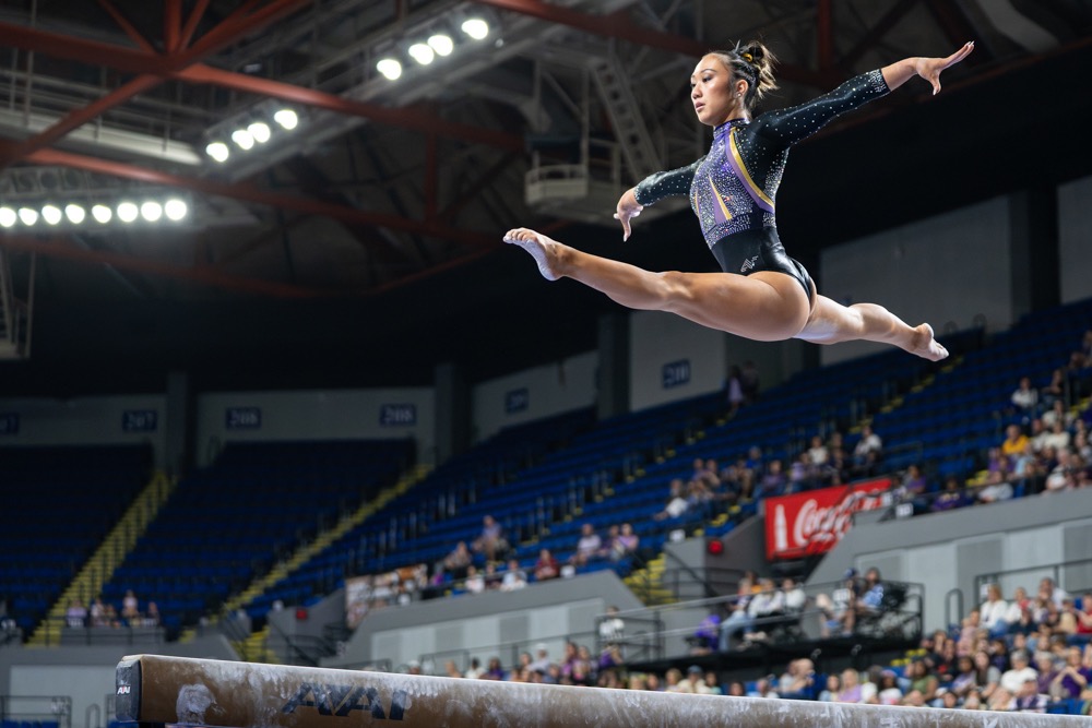 LSU gymnastics all-around sophomore Kailin Chio performs her beam routine during the Podium Challenge against Alabama, North Carolina and Arizona Sunday, March 1, 2026, at the Raising Cane’s River Center in Baton Rouge, La.