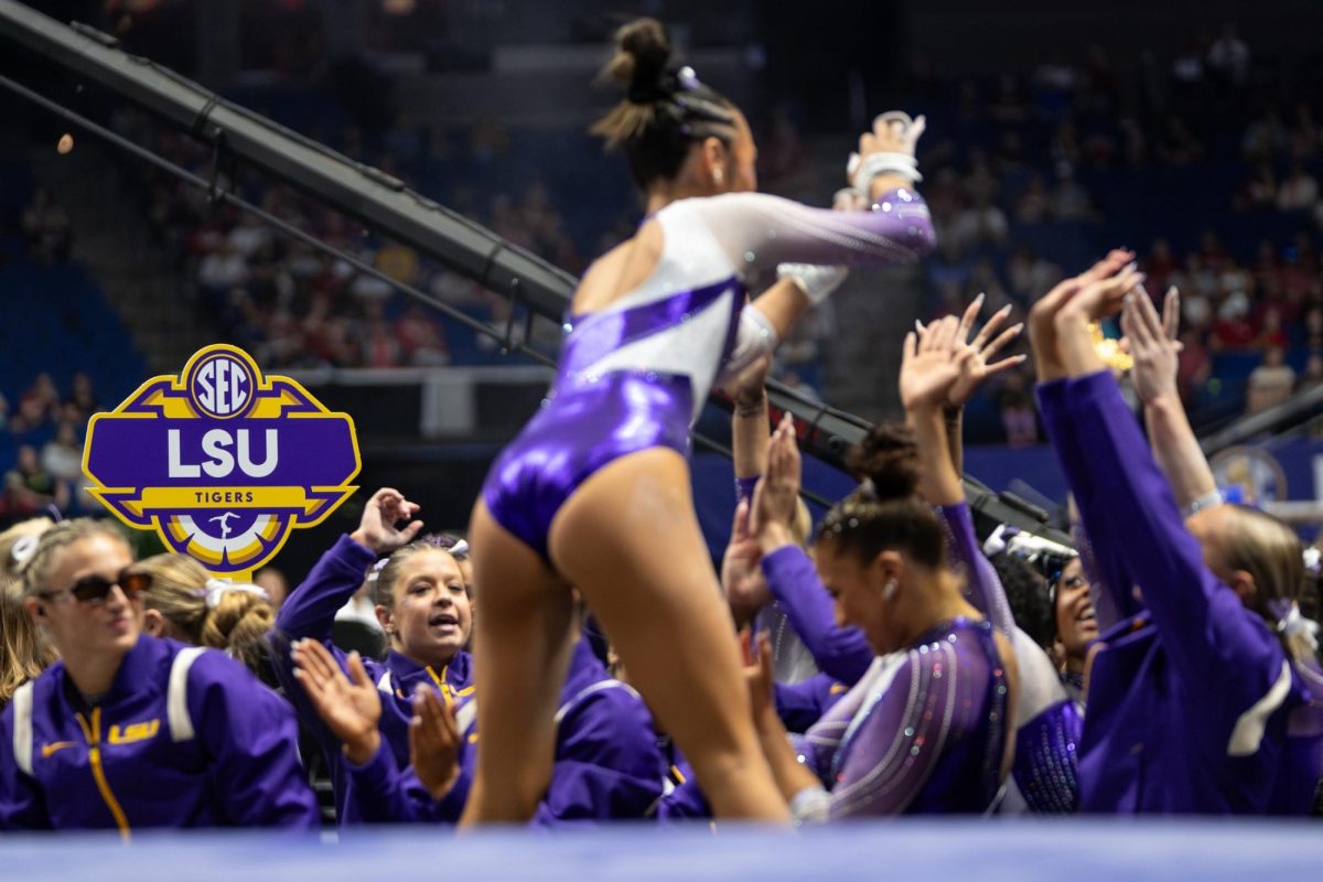 LSU gymnastics all-around sophomore Kailin Chio celebrates with teammates during the Tigers' SEC Championship loss Saturday, March 21, 2026, at the Bank of Oklahoma Center in Tulsa, Okla.