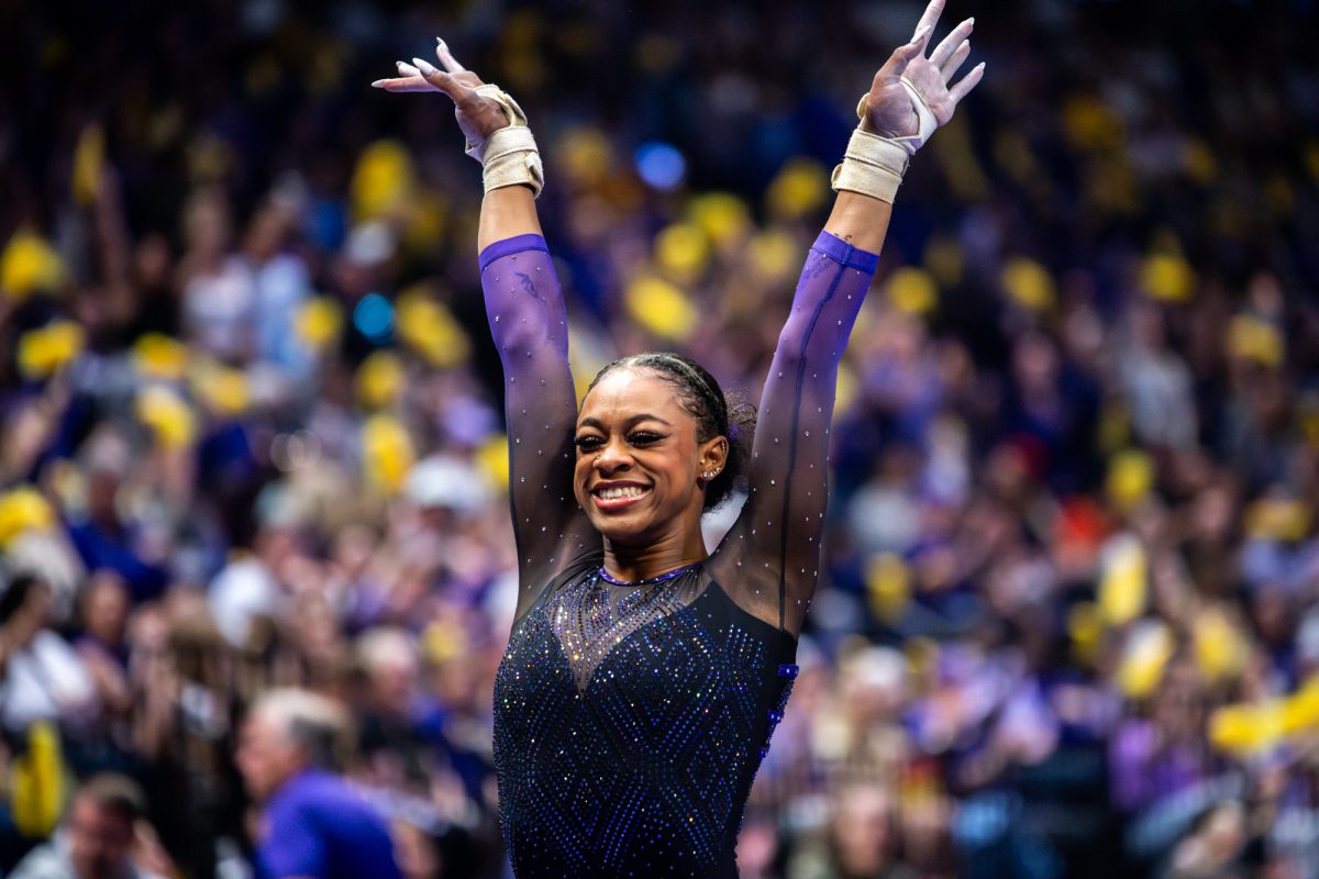 LSU gymnastics all-around junior Amari Drayton smiles after her vault during LSU’s 198.075-197.100 win against Arkansas on Friday, March 13, 2026, at the Pete Maravich Assembly Center in Baton Rouge, La.