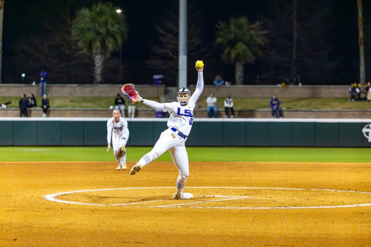 LSU softball sophomore pitcher and utility player Jayden Heavener (00) pitches the ball during LSU’s 11-3 win against NC State on Thursday, Feb. 5, 2026, at Tiger Park in Baton Rouge, La.