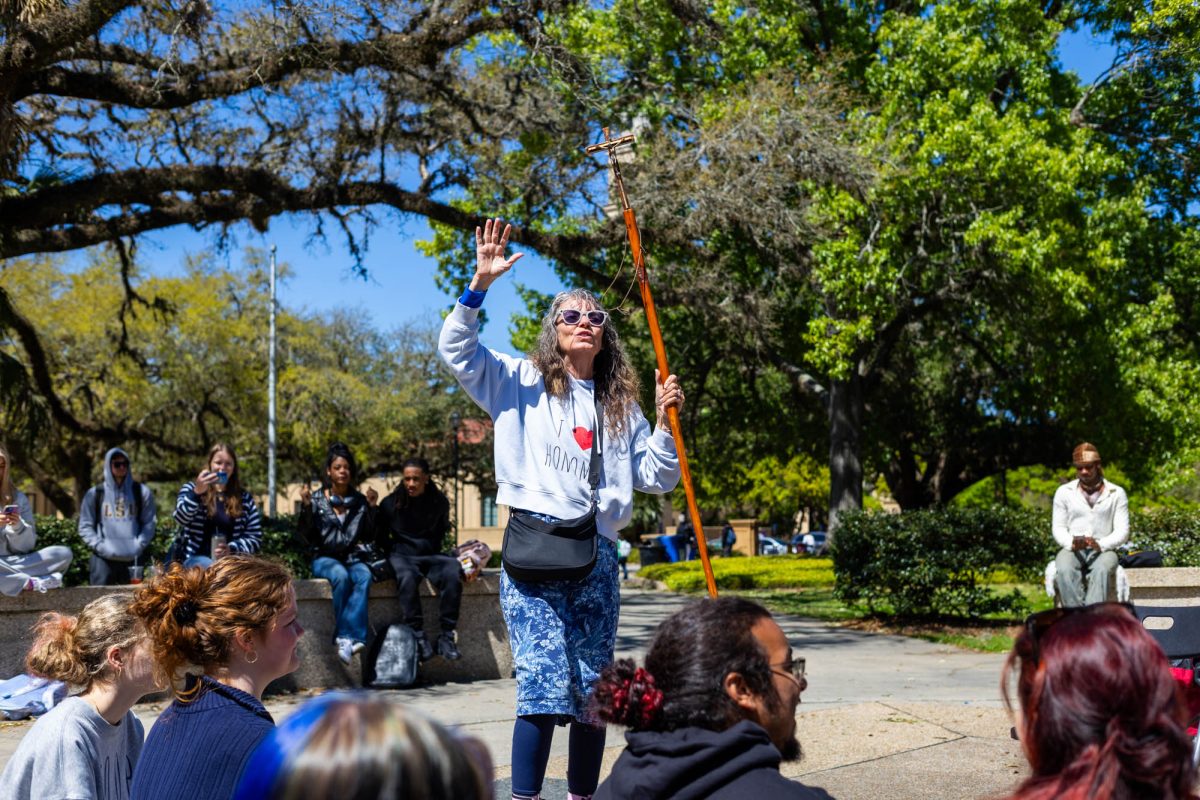 Sister Cindy sings and dances Tuesday, March 17, 2026, in the Free Speech Alley in Baton Rouge, La.