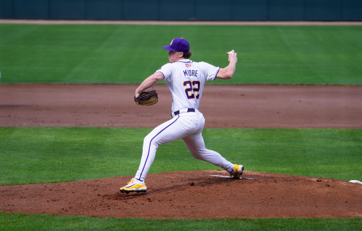 LSU baseball junior right-handed pitcher Cooper Moore (22) pitches the ball during the Tigers' 5-3 win over Milwaukee Saturday, Feb. 14, 2026, at Alex Box Stadium in Baton Rouge, La.