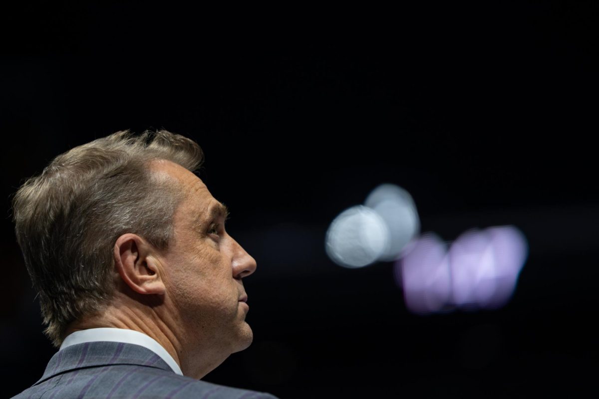 LSU gymnastics head coach Jay Clark looks up during the Tigers' SEC Championship loss Saturday, March 21, 2026, at the Bank of Oklahoma Center in Tulsa, Okla.