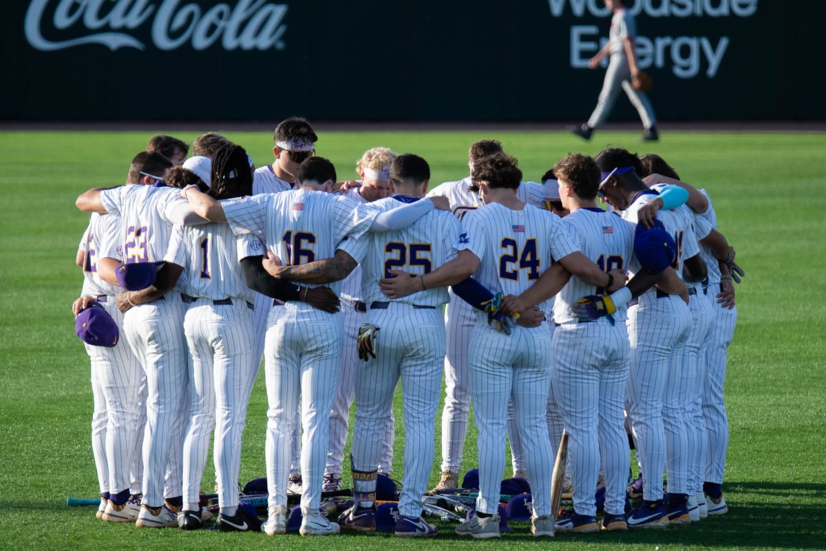 LSU baseball players huddle on the field Tuesday, April 14, 2026, prior to LSU’s 4-2 win against Northwestern State University at Alex Box Stadium in Baton Rouge, La.