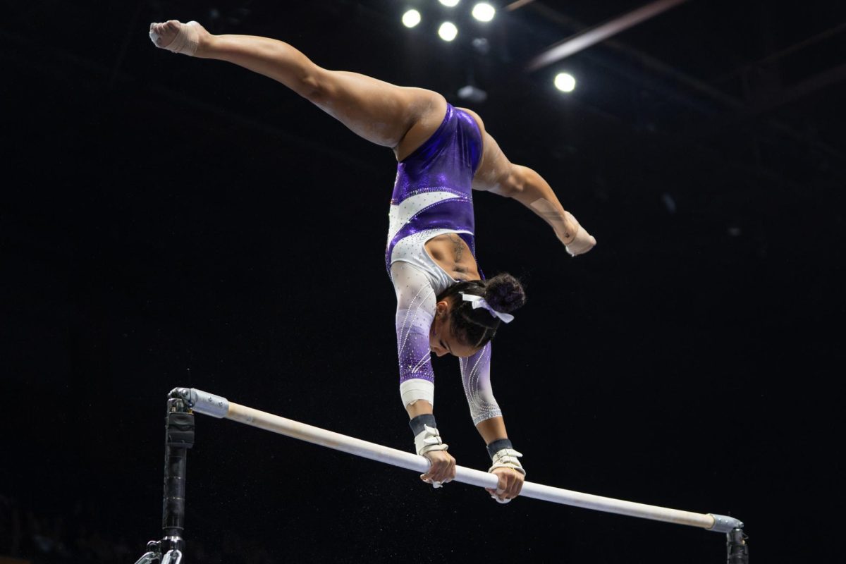 LSU gymnastics all-around junior Konnor McClain performs her uneven bars routine during the Tigers' SEC Championship loss Saturday, March 21, 2026, at the Bank of Oklahoma Center in Tulsa, Okla.