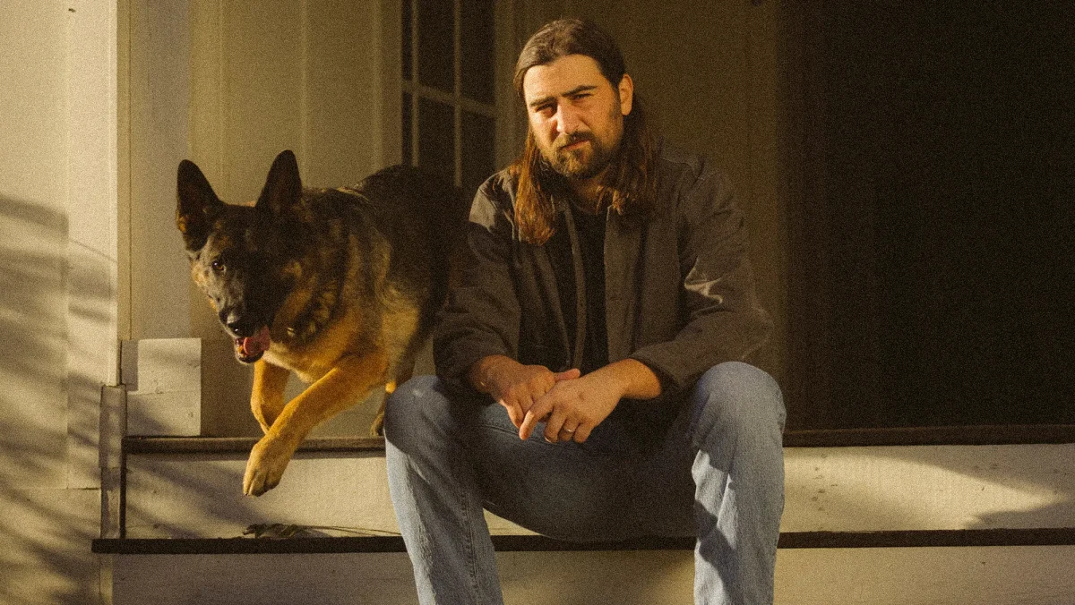 Noah Kahan in a promotional photo for "The Great Divide" album.
