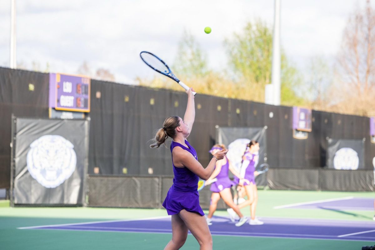 LSU women’s tennis sophomore Ella McDonald hits the ball during her unfinished doubles match against Florida on Thursday, March 5, 2026, at the LSU Tennis Complex in Baton Rouge, La.