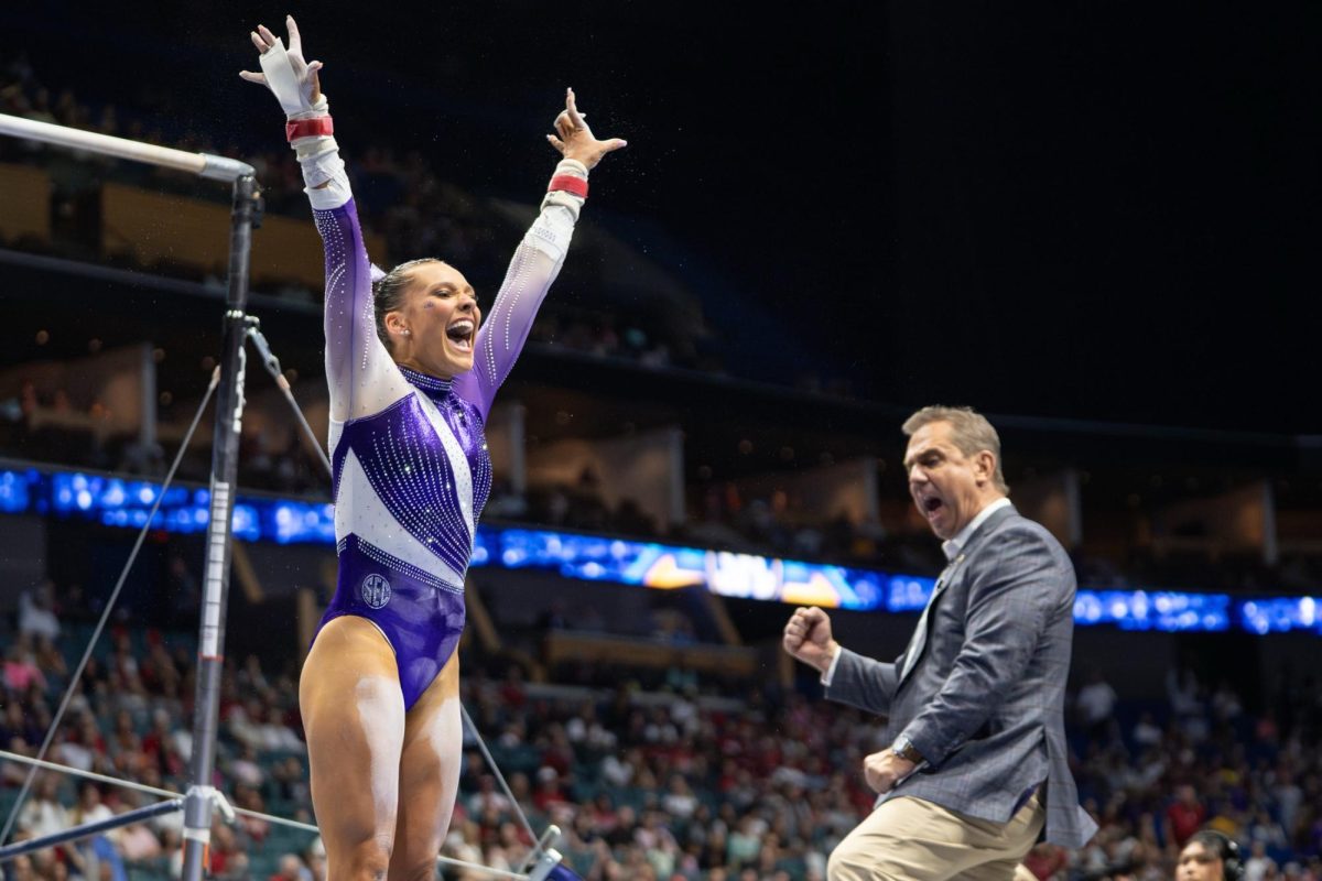 LSU gymnastics all-around sophomore Lexi Zeiss salutes the judges during the Tigers' SEC Championship loss Saturday, March 21, 2026, at the Bank of Oklahoma Center in Tulsa, Okla.