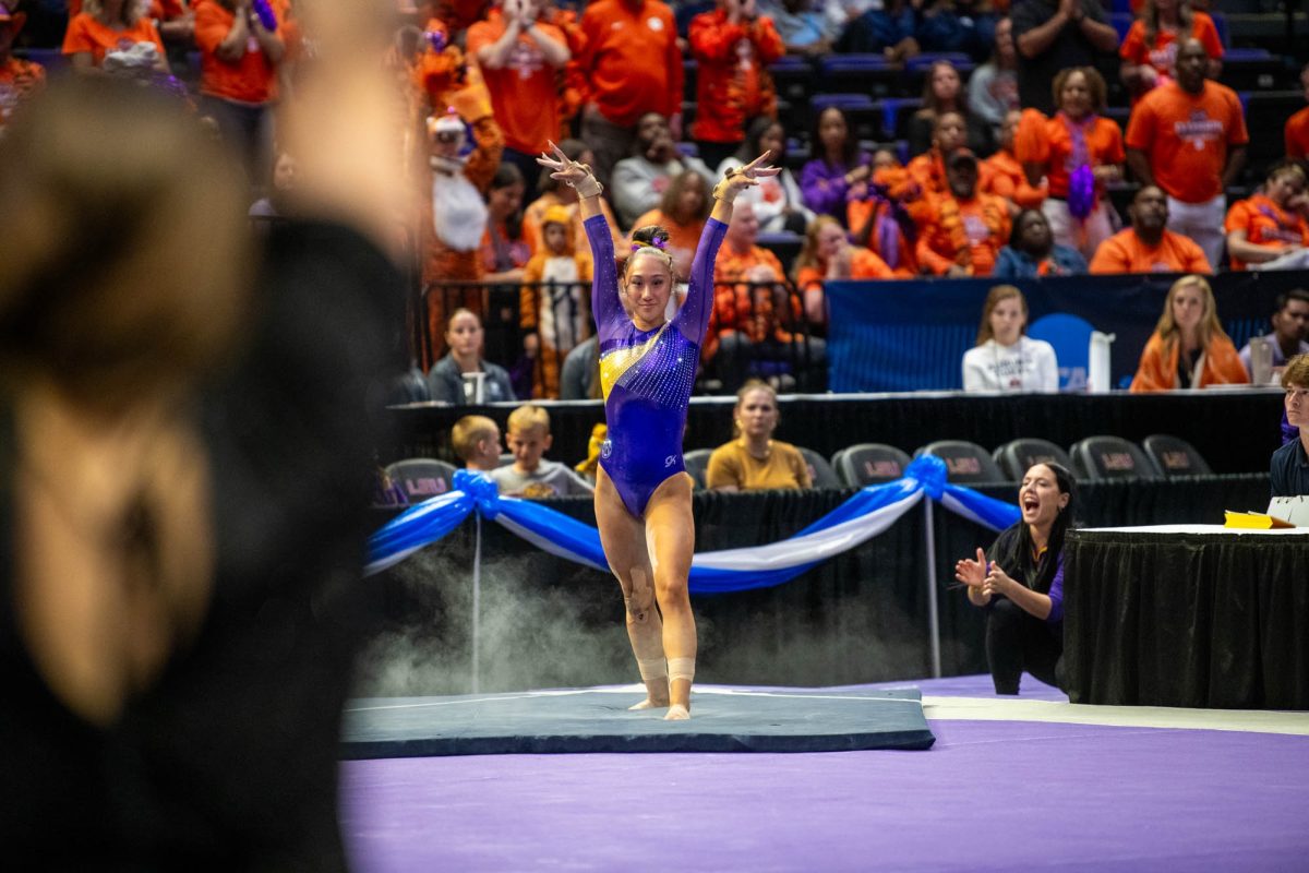 LSU gymnastics sophomore all-around Kailin Chio lands a flip Thursday, April 2, 2026, during their 198.375 win at the Pete Maravich Assembly Center in Baton Rouge, La.