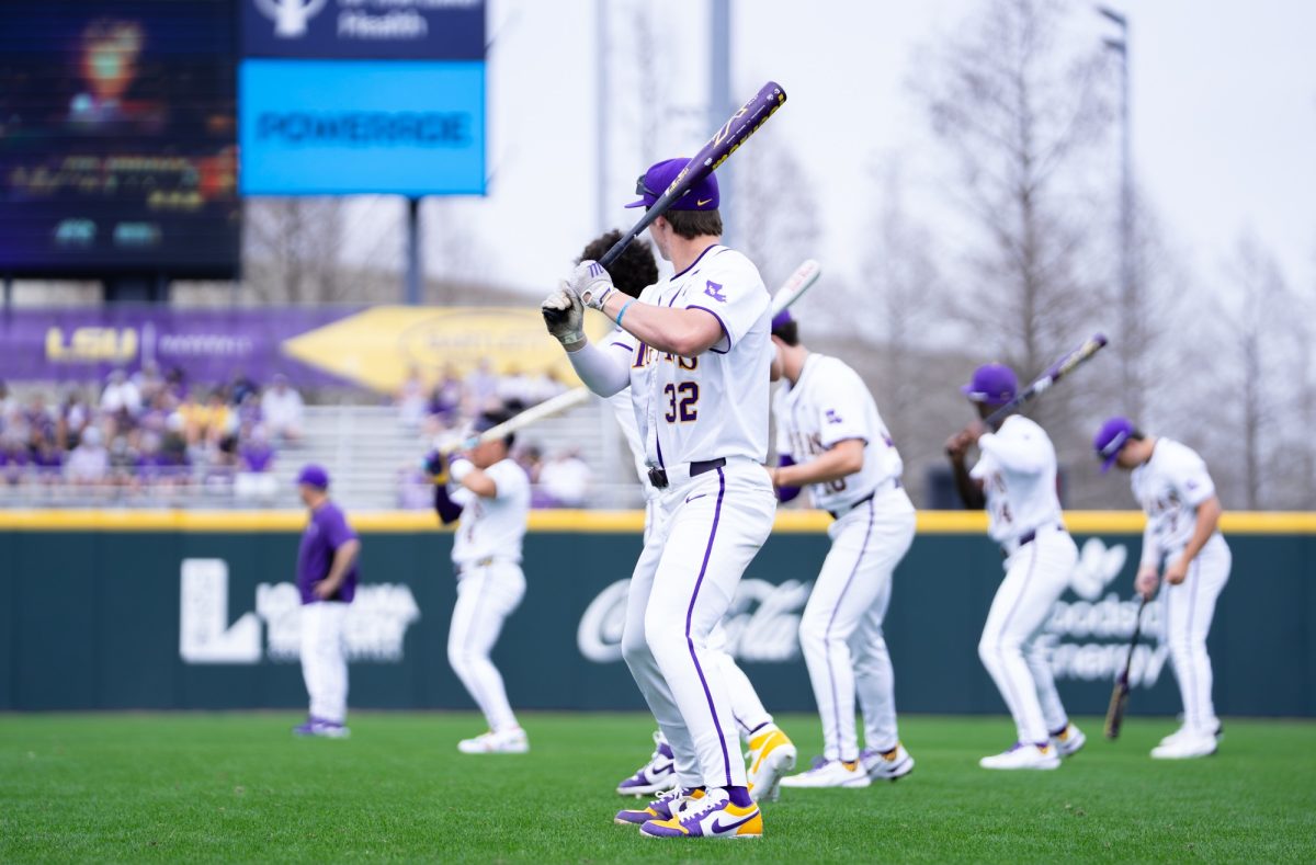 LSU baseball freshman infielder Jack Ruckert (32) takes a practice swing during the Tigers' 5-3 win over Milwaukee Saturday, Feb. 14, 2026, at Alex Box Stadium in Baton Rouge, La.