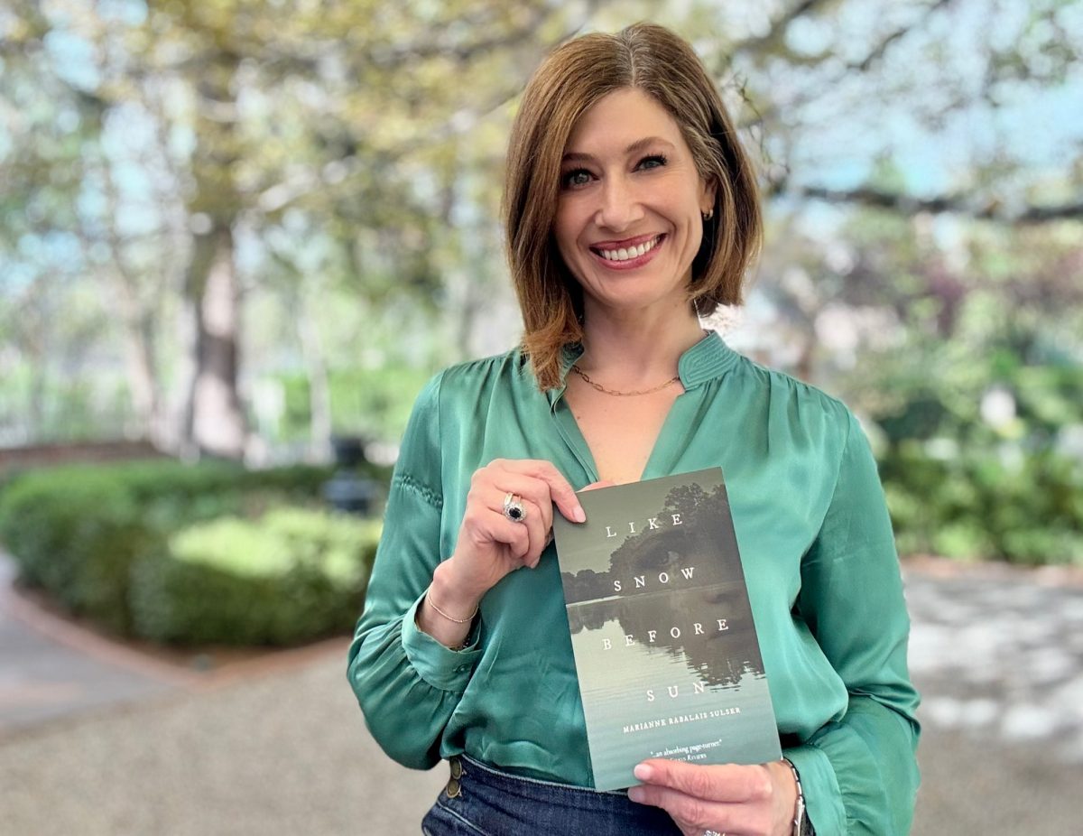 Author and LSU alumna Marianne Rabalais Sulser with debut novel “Like Snow Before Sun.” (Courtesy of Marianne Rabalais Sulser).