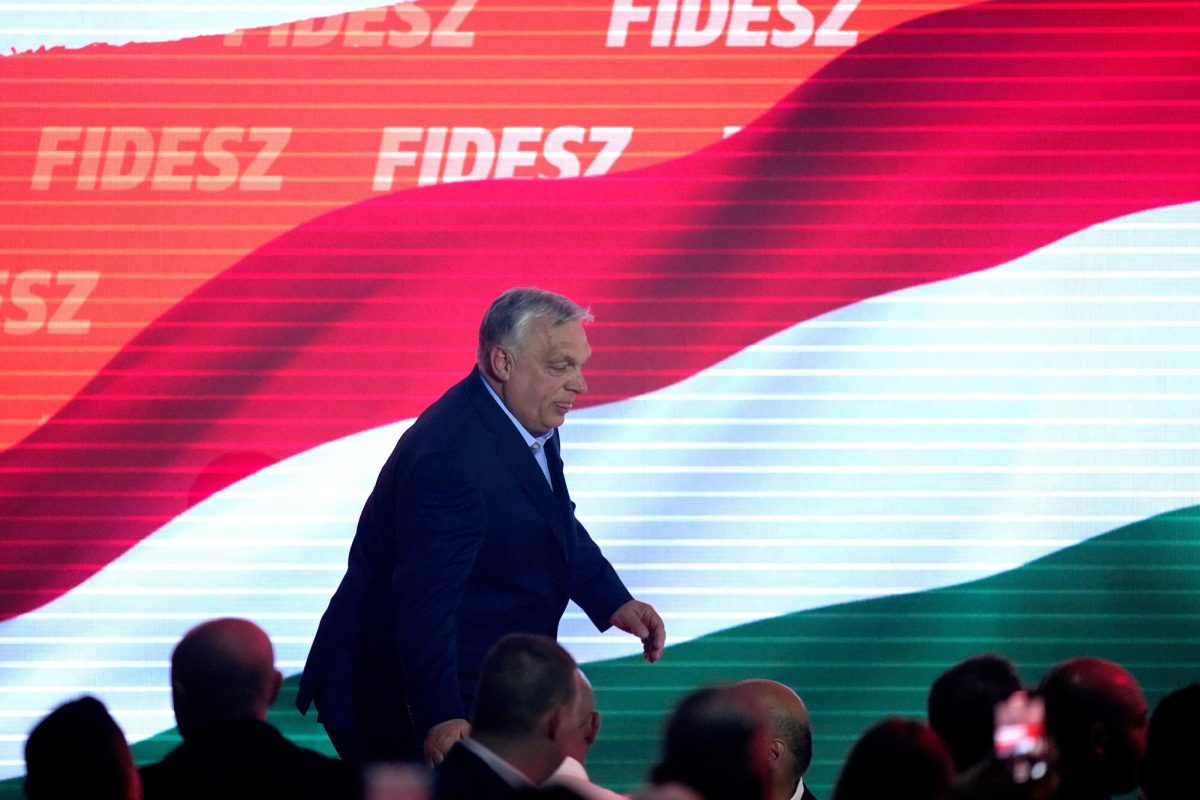Hungary's Prime Minister Viktor Orban arrives on the podium after a parliamentary election in Budapest, Hungary, Sunday, April 12, 2026.