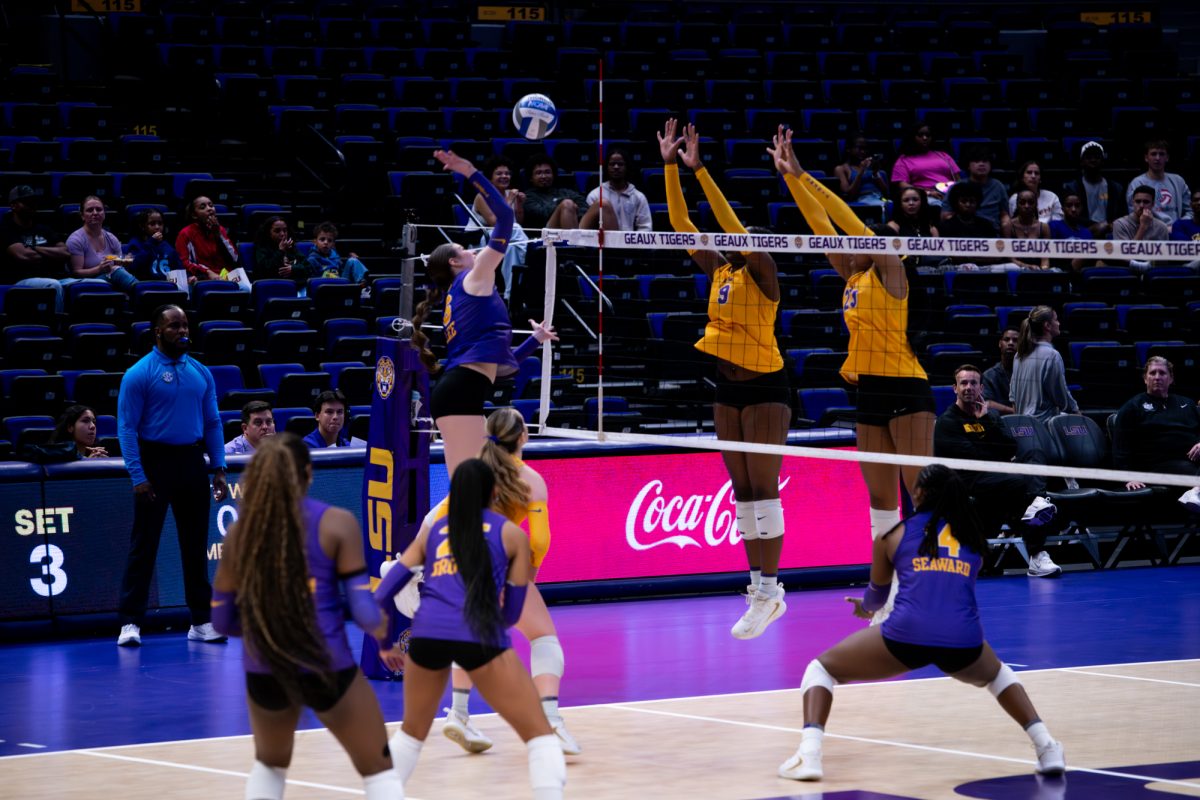 LSU volleyball freshman middle blocker Hannah Lee (6) hits the ball over the net during the purple and gold spring scrimmage on Friday, April 10, 2025, at Pete Maravich Assembly Center in Baton Rouge, La.