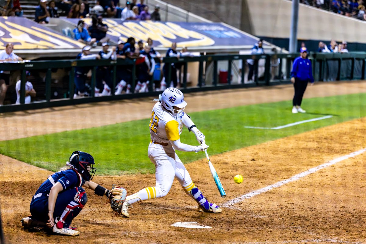 LSU softball redshirt sophomore utility player Tori Edwards (42) hits a home run during LSU’s 6-4 win against Ole Miss on Friday, April 17, 2026, at Tiger Park in Baton Rouge, La.