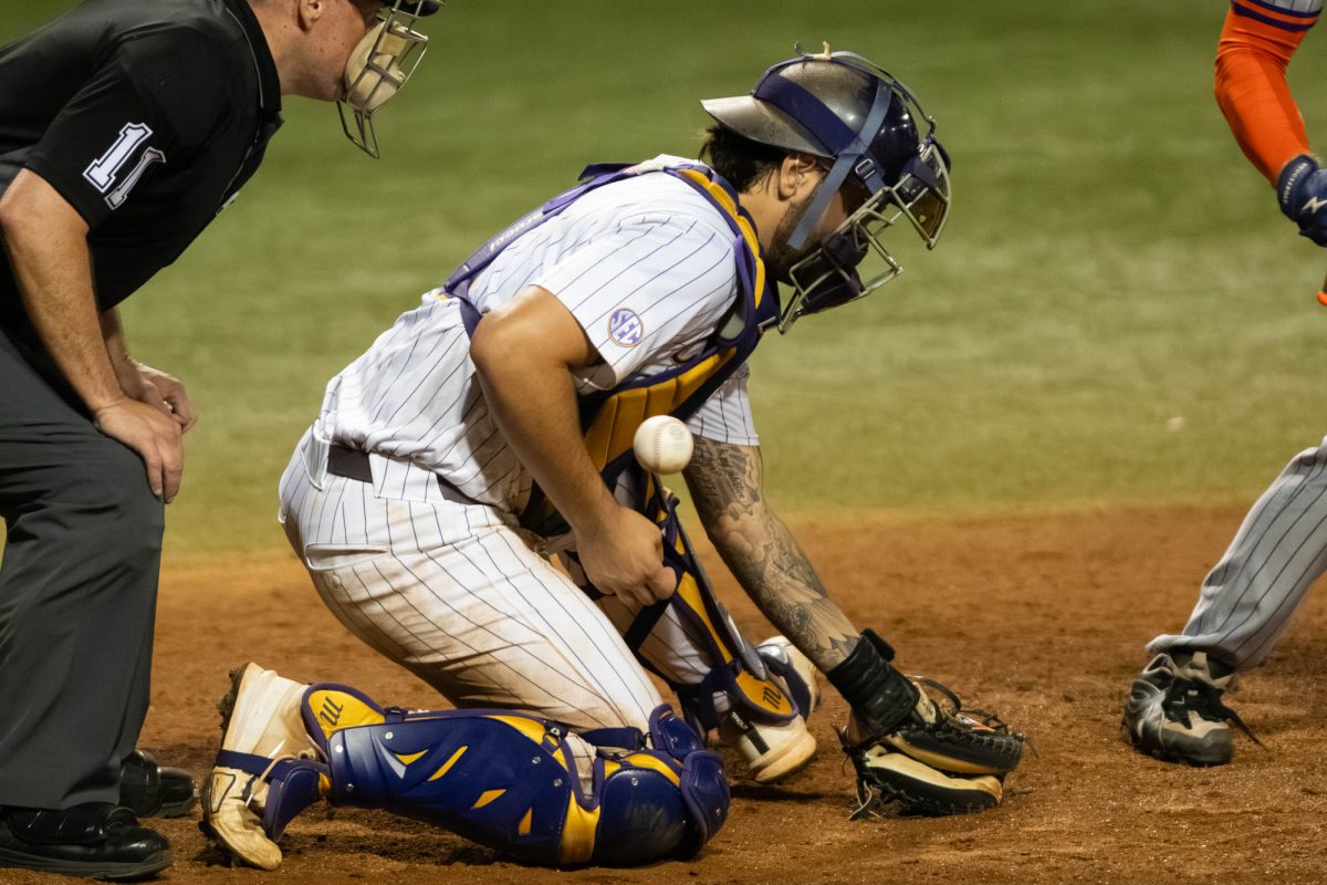 LSU baseball sophomore catcher Cade Arrambide (0) misses the ball Tuesday, April 14, 2026, during LSU’s 4-2 win against Northwestern State University at Alex Box Stadium in Baton Rouge, La.