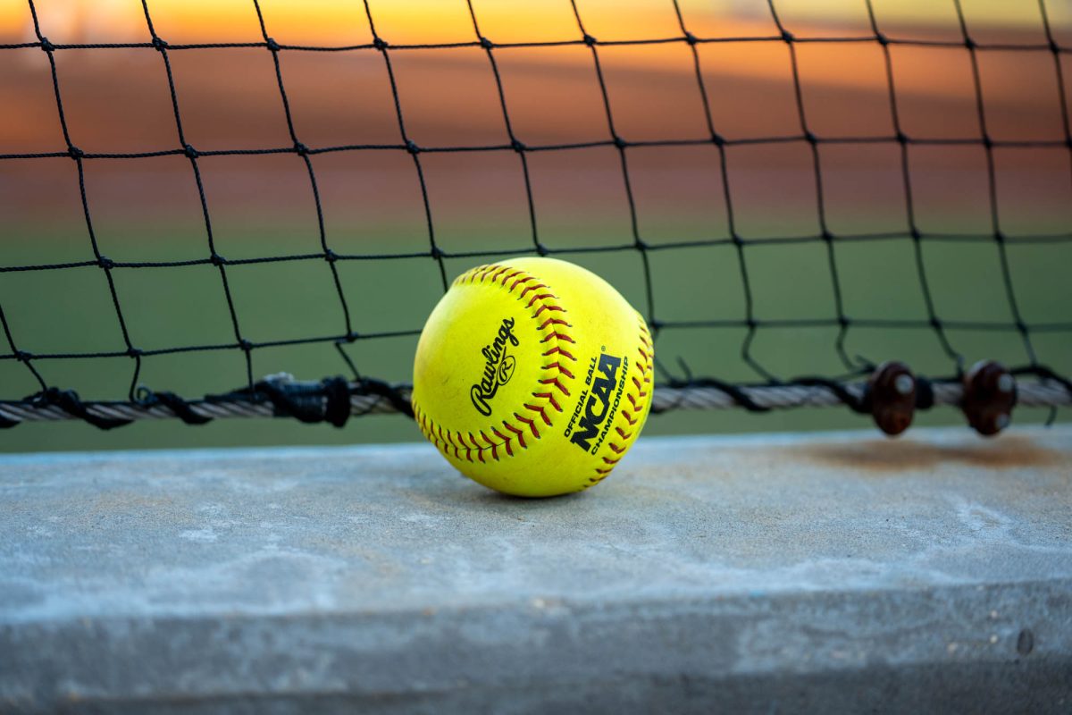 A softball sits by the netting during LSU softball's win against Northwest Florida State Thursday, Oct. 30, 2025, at Tiger Park in Baton Rouge, La.
